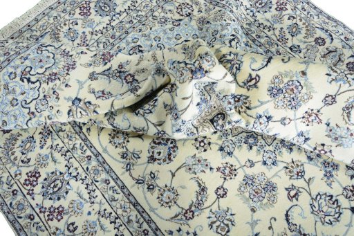 Surface texture of New Nain rug with natural Wool and intricate pattern