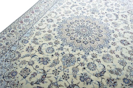 Backside of handmade New Nain rug showing knot structure and weave density