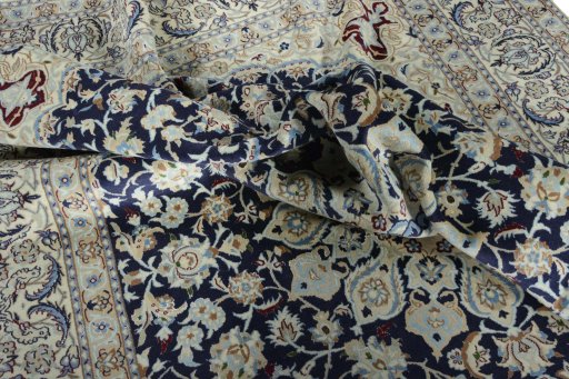 Surface texture of New Nain rug with natural Wool and intricate pattern