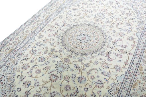 Backside of handmade New Nain rug showing knot structure and weave density