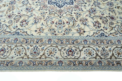 Corner detail of New Nain rug showing border pattern and Wool pile