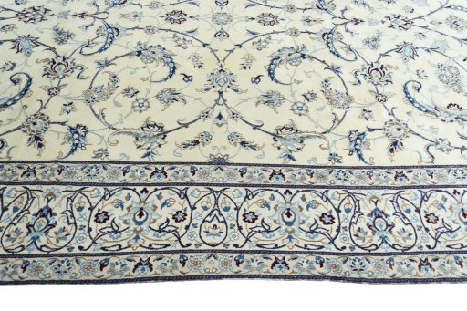 Corner detail of New Nain rug showing border pattern and Wool pile