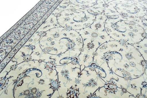Backside of handmade New Nain rug showing knot structure and weave density
