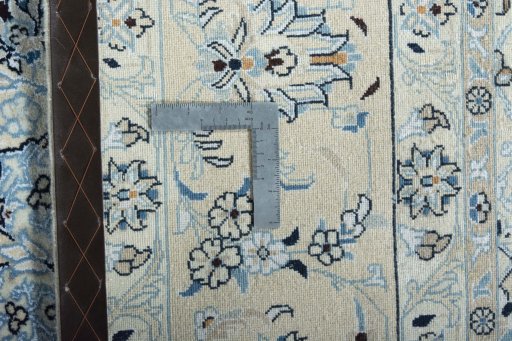 Surface texture of New Nain rug with natural Wool and intricate pattern