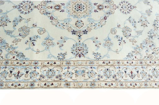Corner detail of New Nain rug showing border pattern and Cork pile