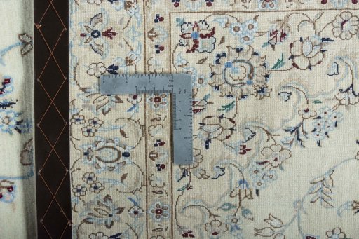 Backside of handmade New Nain rug showing knot structure and weave density