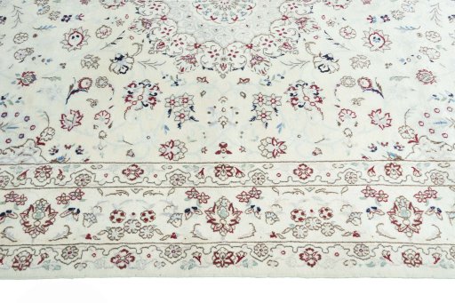 Corner detail of New Nain rug showing border pattern and Wool pile