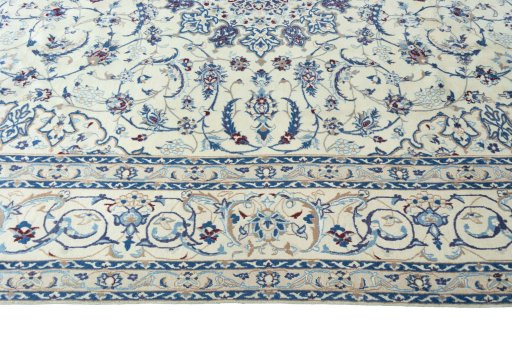 Corner detail of New Nain rug showing border pattern and Wool pile