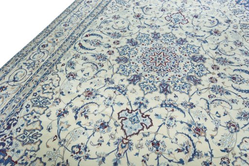 Backside of handmade New Nain rug showing knot structure and weave density