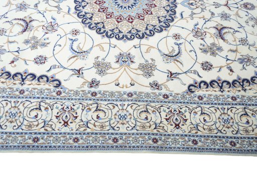 Corner detail of New Nain rug showing border pattern and Cork pile