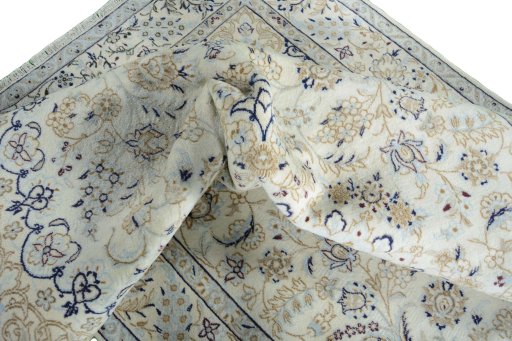 Surface texture of New Nain rug with natural Wool and intricate pattern
