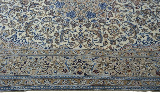 Corner detail of New Nain rug showing border pattern and Wool pile