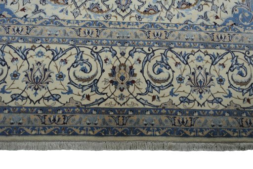 Corner detail of New Nain rug showing border pattern and Wool pile