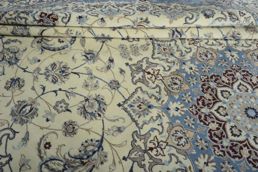 Surface texture of New Nain rug with natural Wool and intricate pattern