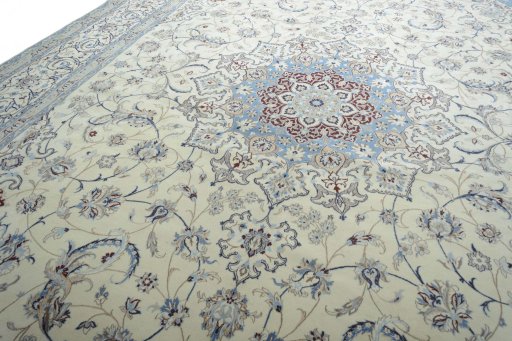 Backside of handmade New Nain rug showing knot structure and weave density