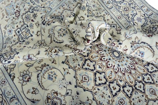Surface texture of New Nain rug with natural Wool and intricate pattern