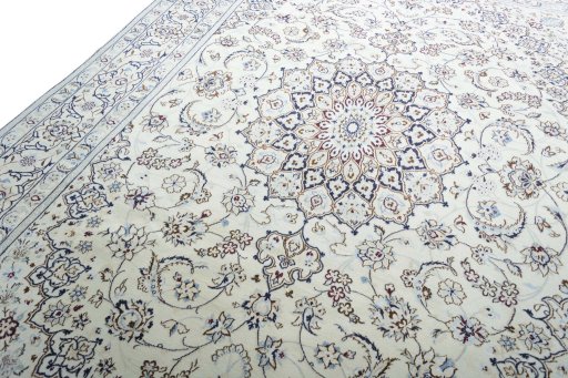 Backside of handmade New Nain rug showing knot structure and weave density