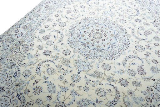 Backside of handmade New Nain rug showing knot structure and weave density