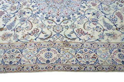 Corner detail of New Nain rug showing border pattern and Wool pile