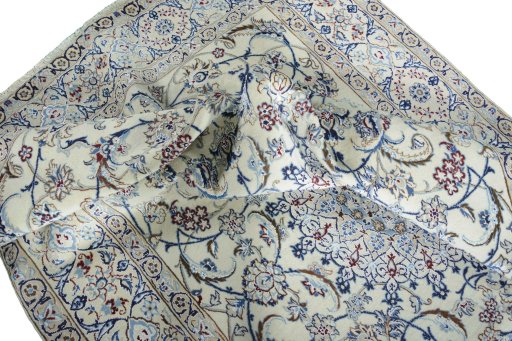 Surface texture of New Nain rug with natural Wool and intricate pattern