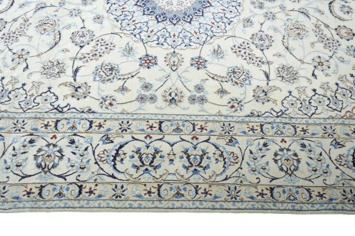 Corner detail of New Nain rug showing border pattern and Wool pile