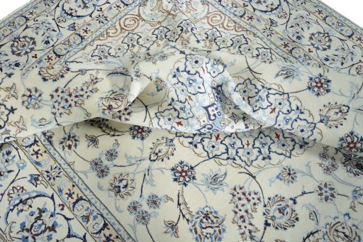 Surface texture of New Nain rug with natural Wool and intricate pattern