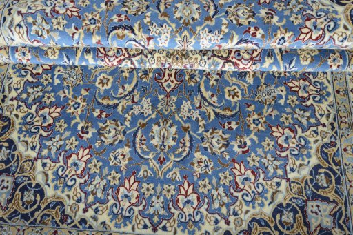 Close-up detail of 2000s Nain rug from Iran / Persia showing Wool weave