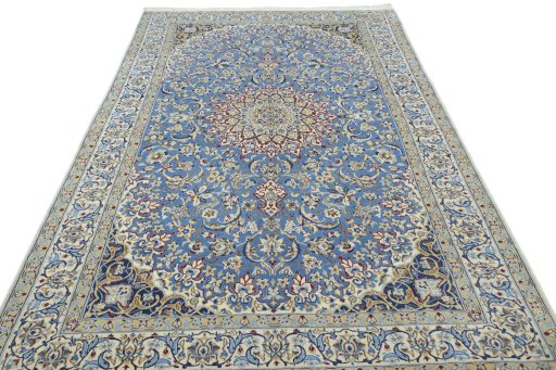 Surface texture of 2000s Nain rug with natural Wool and intricate pattern