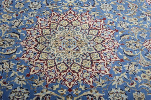 Central medallion detail of 2000s Nain rug from Iran / Persia