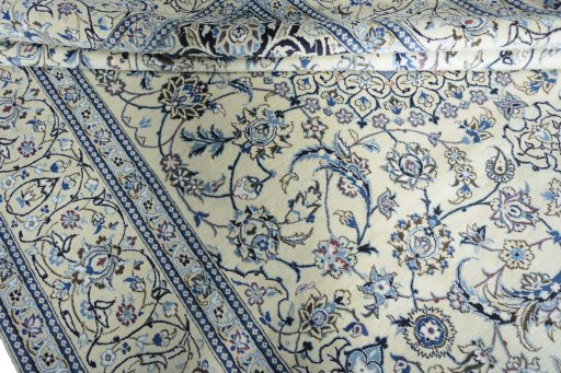 Close-up detail of New Nain rug from Iran / Persia showing Wool weave