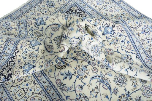 Surface texture of New Nain rug with natural Wool and intricate pattern