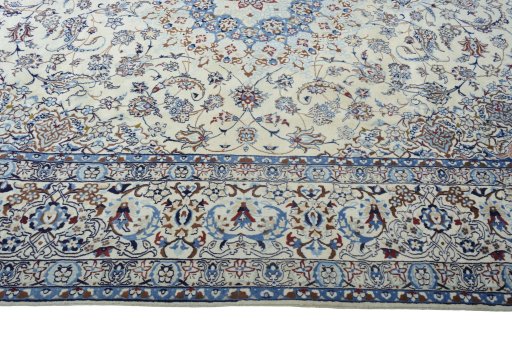 Corner detail of New Nain rug showing border pattern and Wool pile