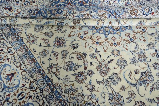 Close-up detail of New Nain rug from Iran / Persia showing Wool weave