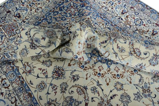 Surface texture of New Nain rug with natural Wool and intricate pattern