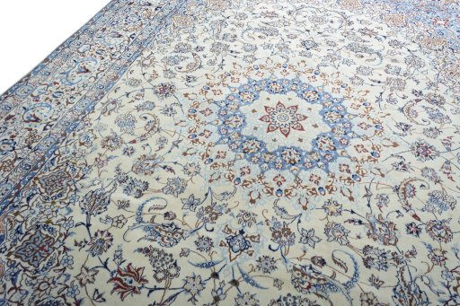 Backside of handmade New Nain rug showing knot structure and weave density