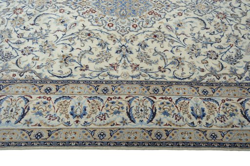 Corner detail of New Nain rug showing border pattern and Wool pile