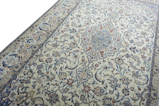Backside of handmade New Nain rug showing knot structure and weave density