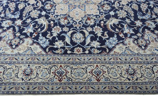 Corner detail of New Nain rug showing border pattern and Wool pile