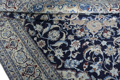 Close-up detail of New Nain rug from Iran / Persia showing Wool weave