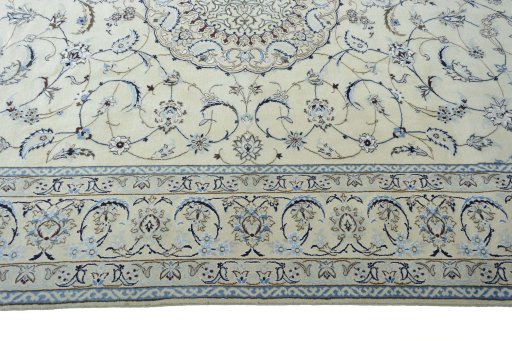 Corner detail of New Nain rug showing border pattern and Wool pile