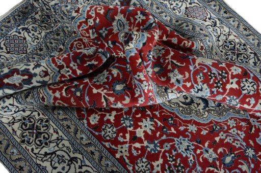 Surface texture of New Nain rug with natural Wool and intricate pattern