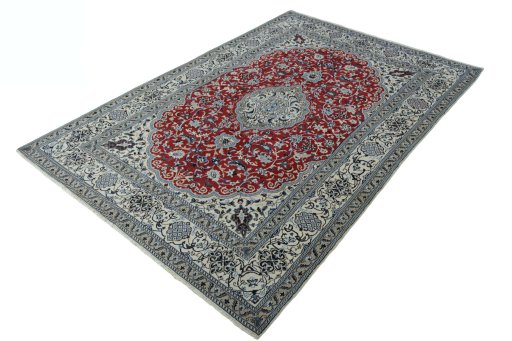 Corner detail of New Nain rug showing border pattern and Wool pile