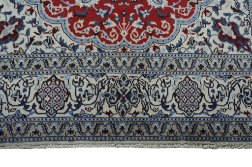 Full view of New Nain rug from Iran / Persia, 291 × 198 cm in Red tones