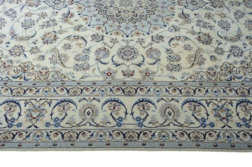Corner detail of New Nain rug showing border pattern and Silk pile
