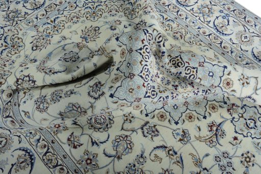 Surface texture of New Nain rug with natural Silk and intricate pattern