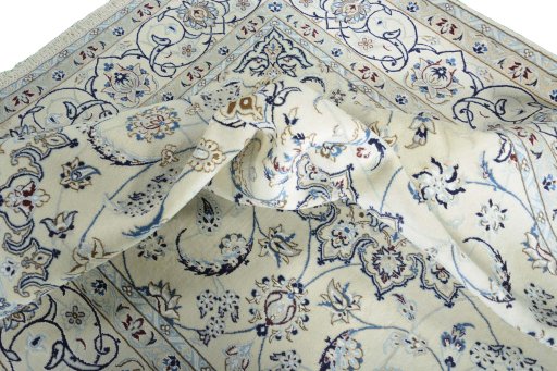 Surface texture of New Nain rug with natural Wool and intricate pattern