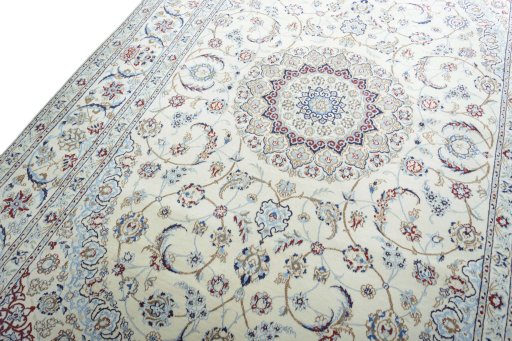 Backside of handmade New Nain rug showing knot structure and weave density