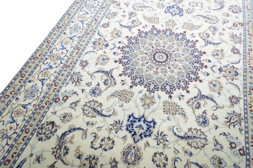 Backside of handmade New Nain rug showing knot structure and weave density