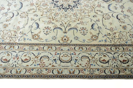 Corner detail of New Nain rug showing border pattern and Wool pile