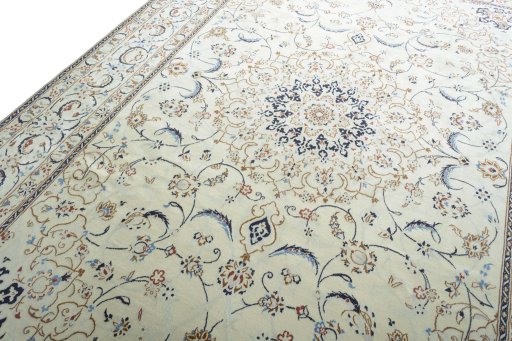 Backside of handmade New Nain rug showing knot structure and weave density